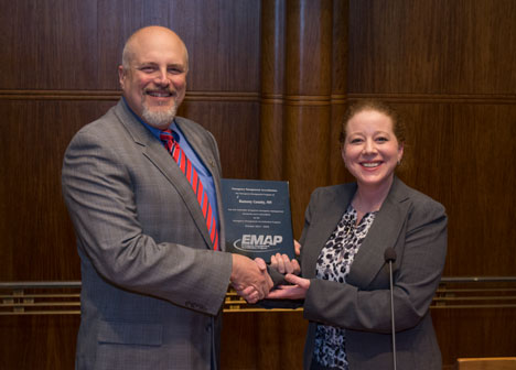 EMAP Executive Director presents certification plaque to Emergency Management director