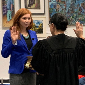 Commissioner Fretham taking oath of office