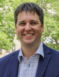 Portrait of Josh Olson.