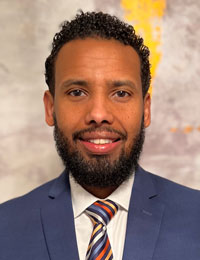 Portrait of Nadir Abdi.
