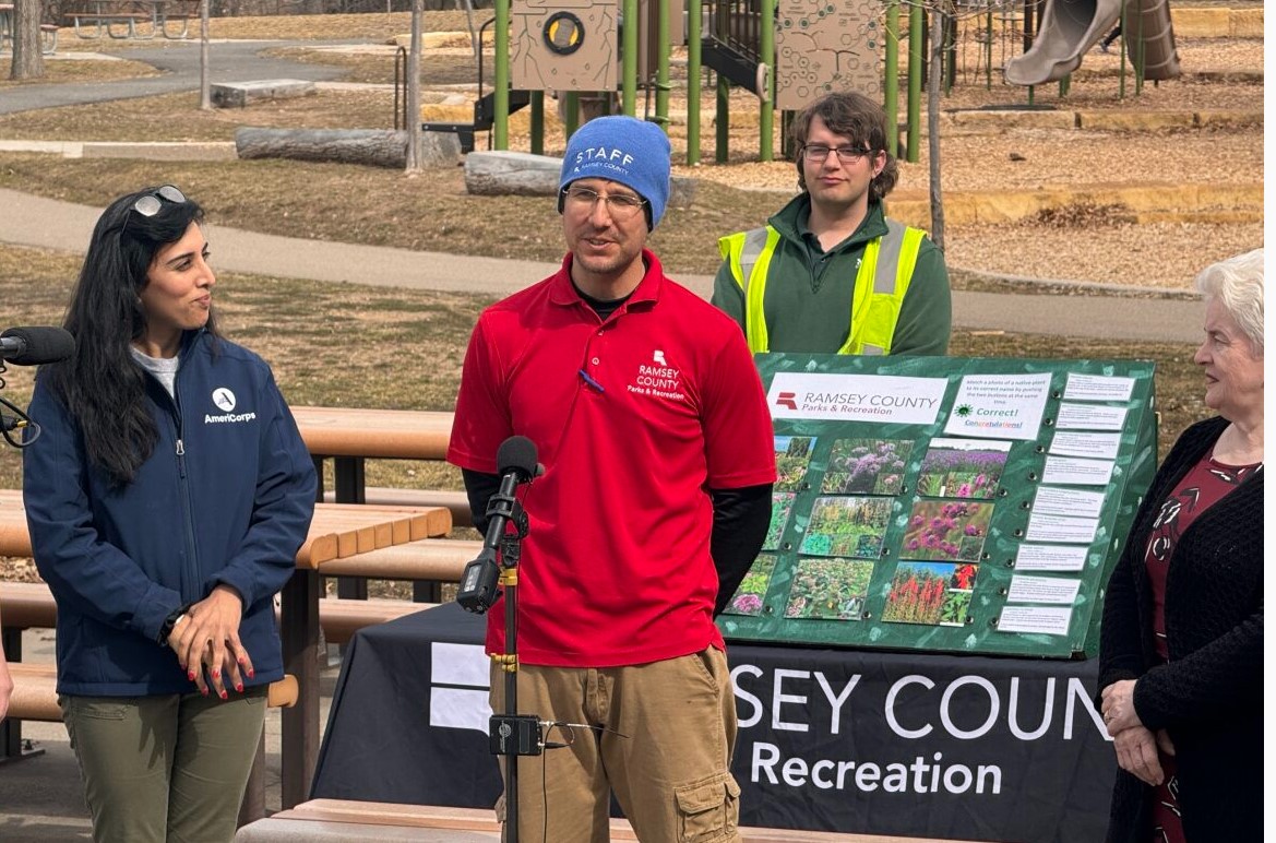 Director Sonali Nijhawan and a Ramsey County Parks and Recreation/Soil and Water staff member speaking at the event.