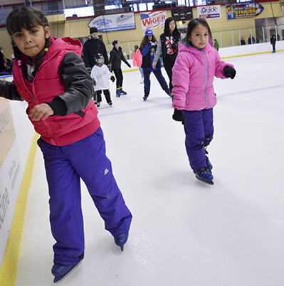 Girls ice skating 