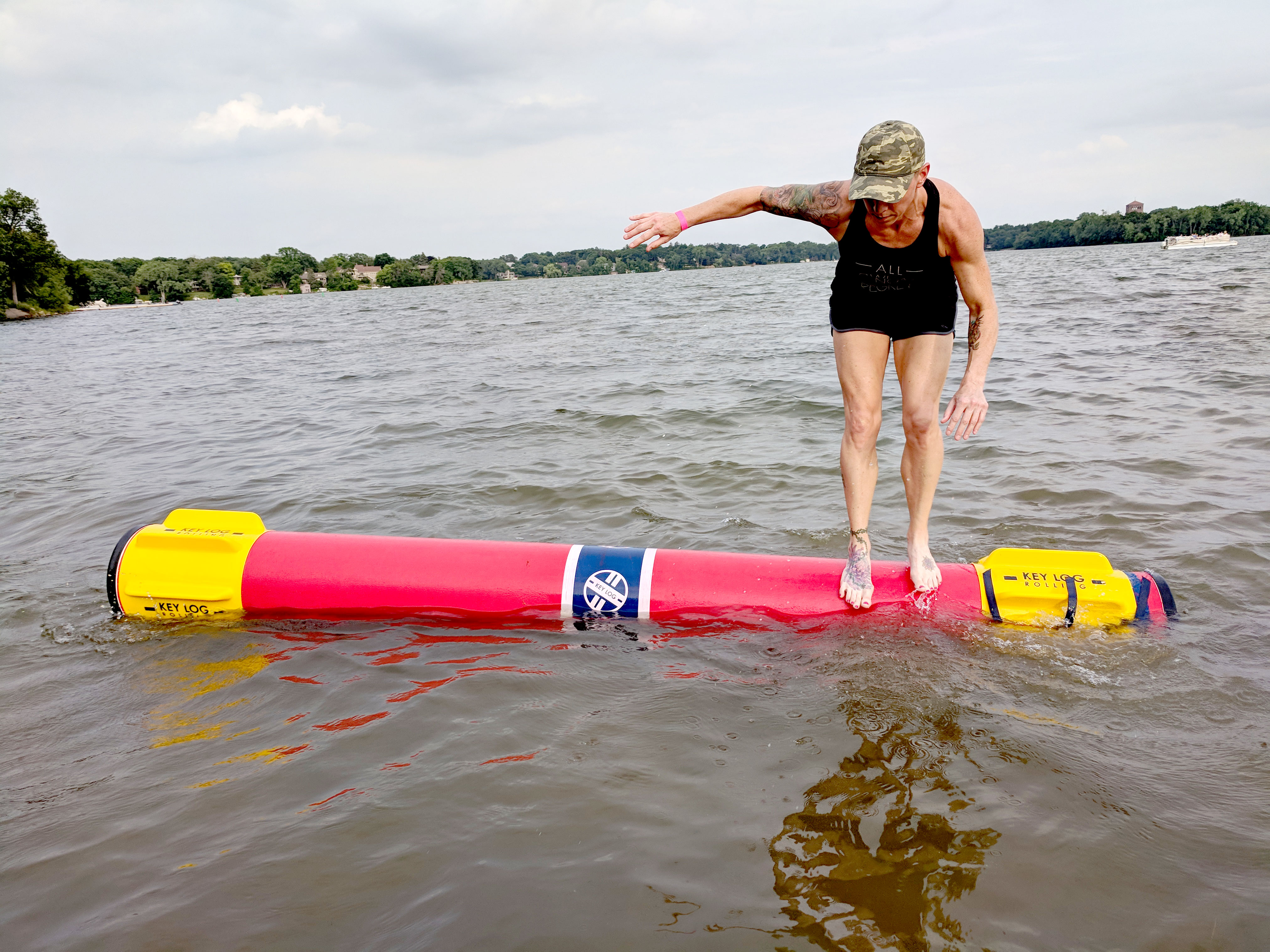 Program participant log rolling at Lake Johanna