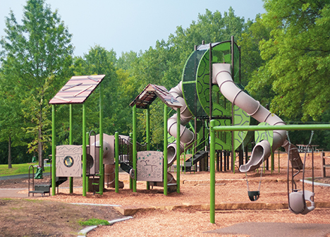 Playground equipment at Battle Creek Regional Park including swings and slides