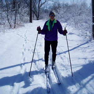 Cross-country skier on country trail Cross-country skier on country trail