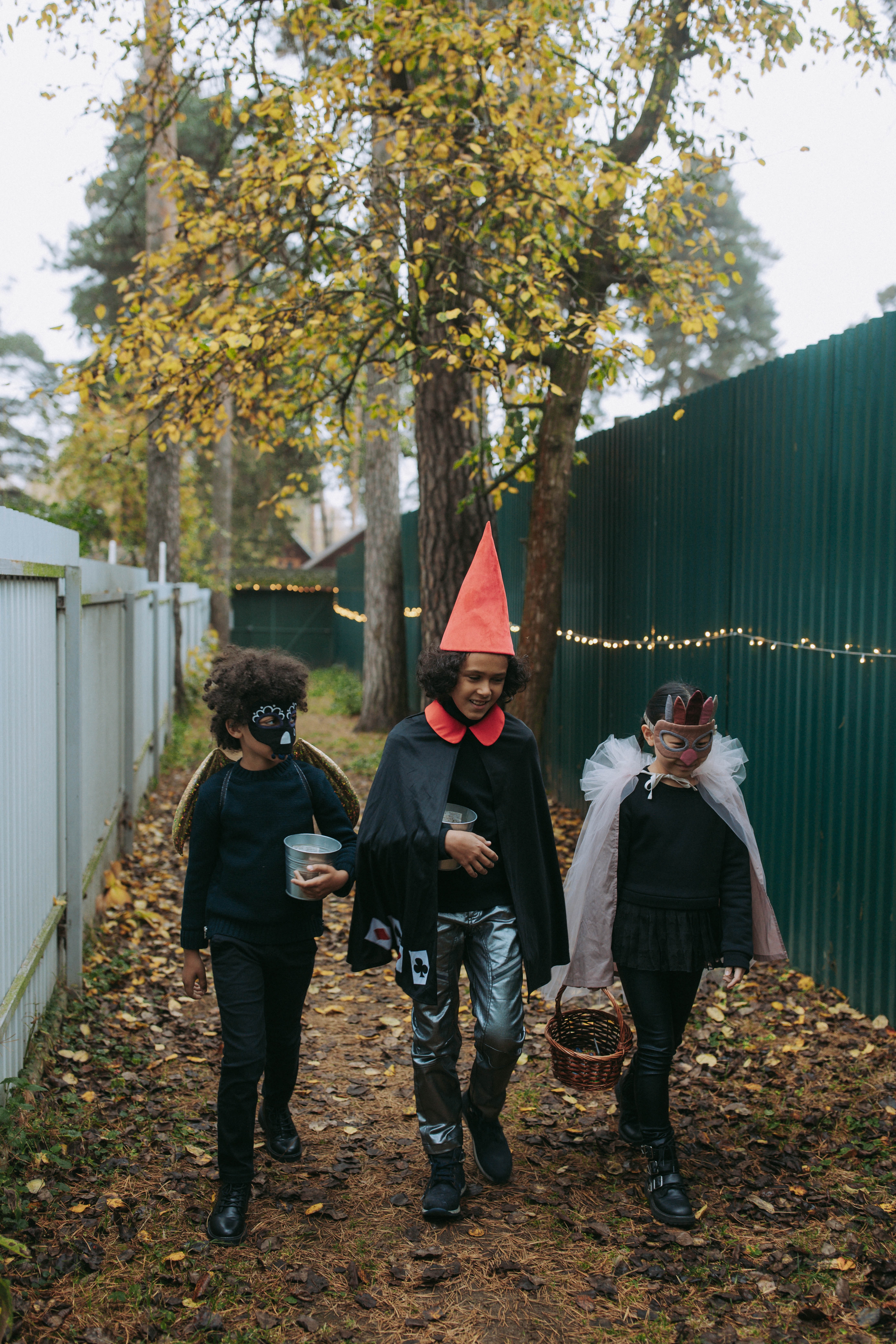 Kids wearing Halloween costumes