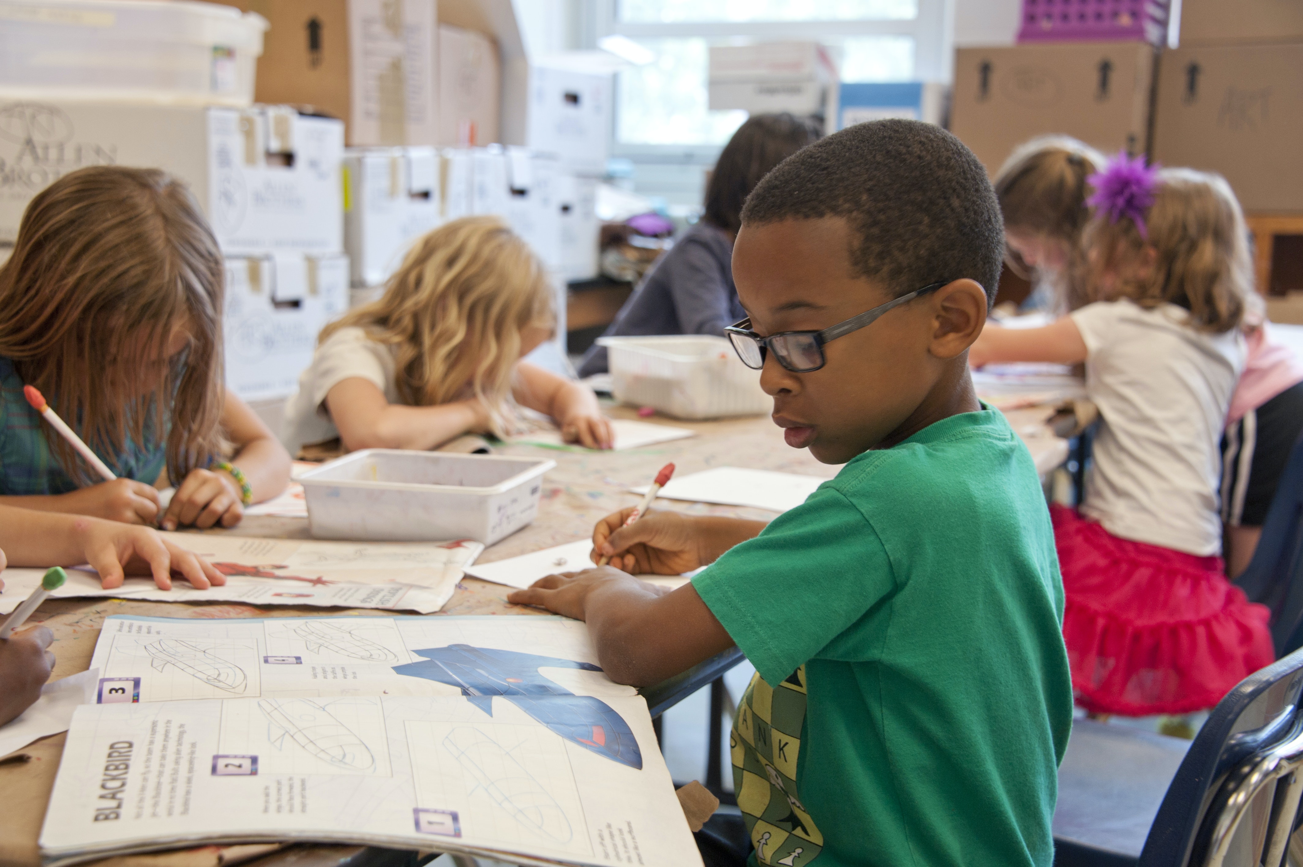 Kids working at a table