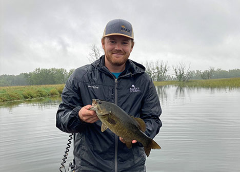 Alex fishing on a lake in northern Minnesota