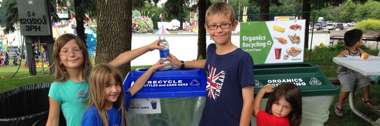 Children using recycling containers