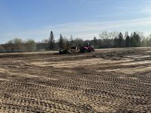 Construction truck moving direct at the Rice Creek Commons Groundbreaking