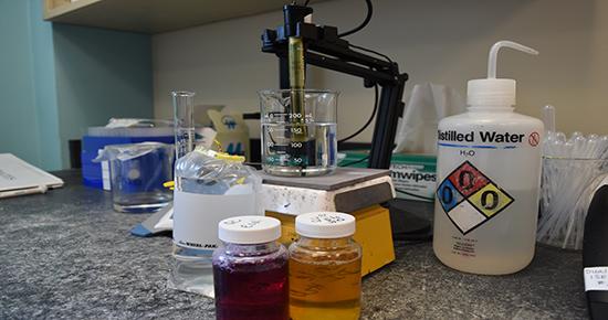 Laboratory table with well water testing in process