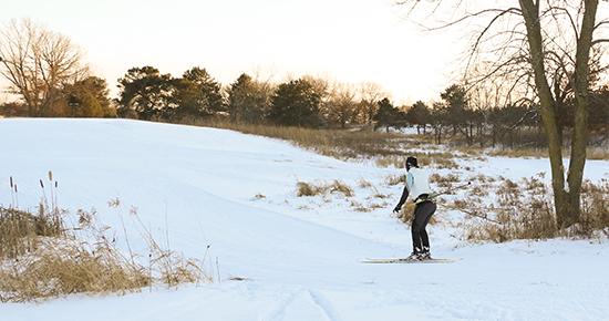 Woman skis at Battle Creek Regional Park Battle Creek Cross Country Skiing