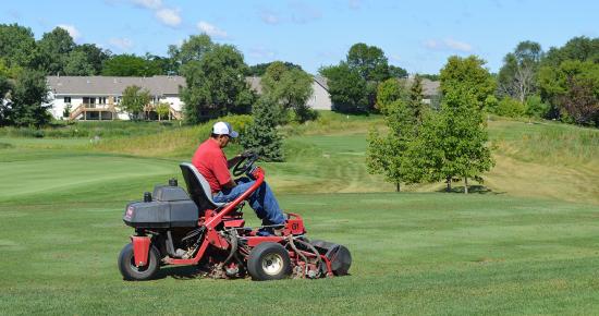 Golf course grass mowing