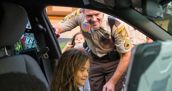 Officer with children