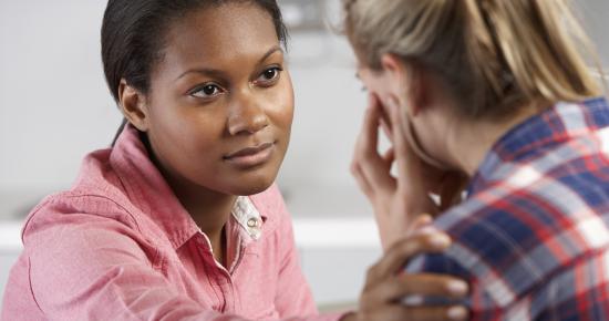 Two females talking